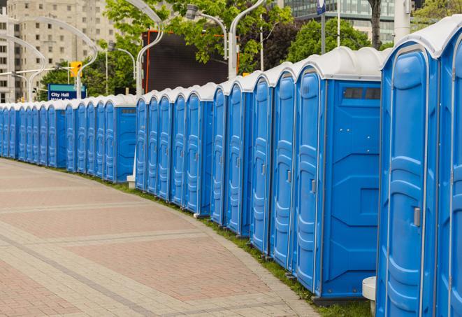 a line of brightly-colored portable restrooms, perfect for outdoor festivals and concerts in Altadena CA